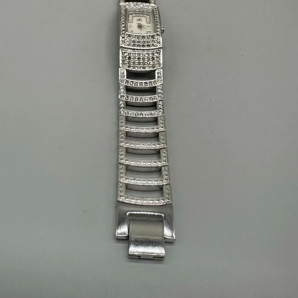 Adee Kaye Watch Women Silver Rhinestone Bracelet Mother of Pearl Dial Works 7